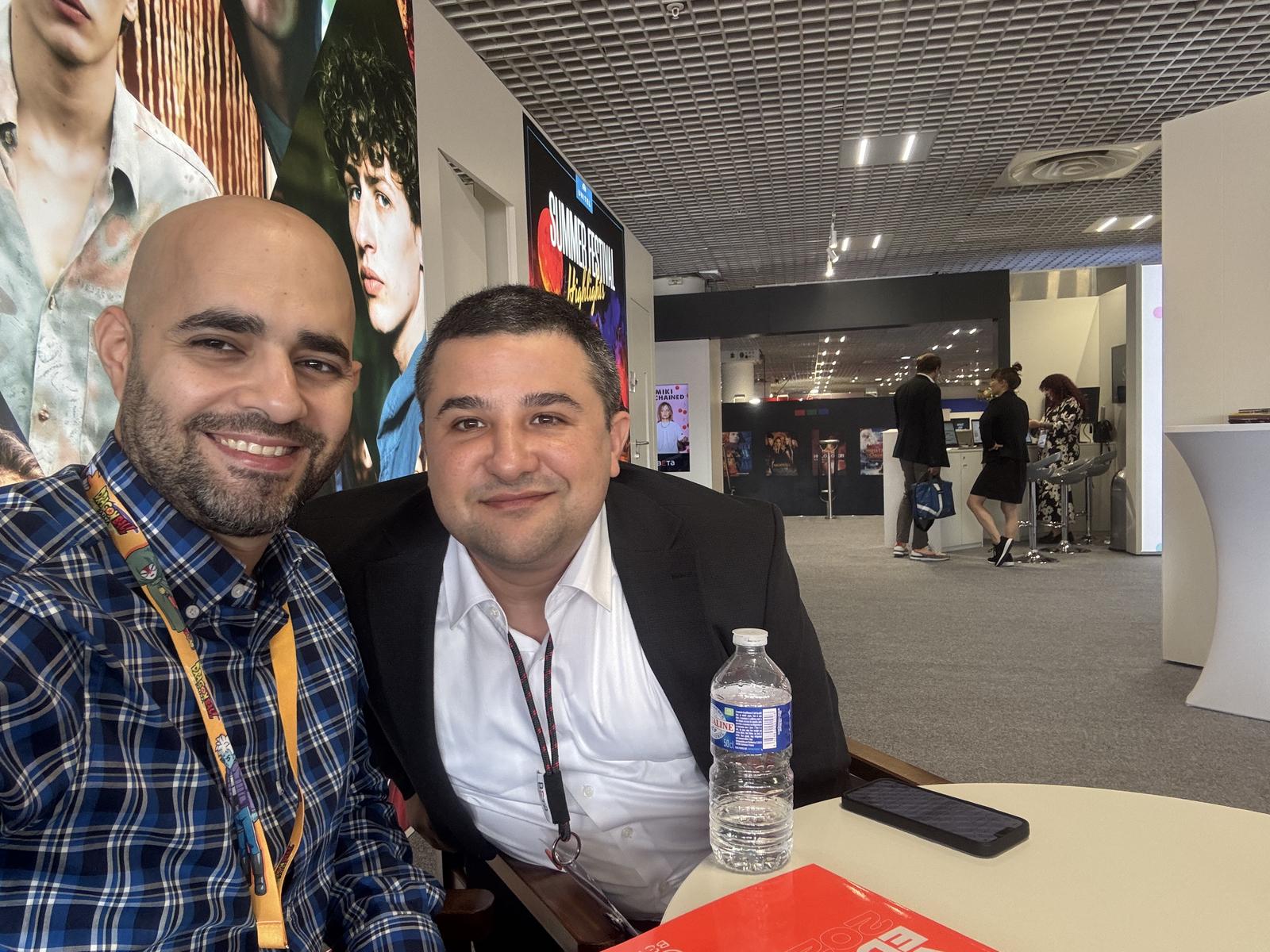 Hassan Krayem meeting an international media partner during MIPCOM 2024 in Cannes.